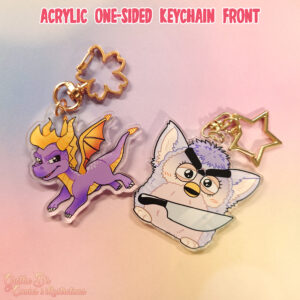 An image showing two different keychains, both being with the print on only one side. The backside being white. But covered in Epoxy resin to protect the print.