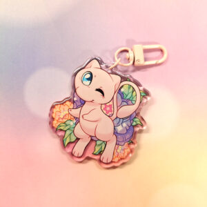 A keychain with both the regular and shiny colors of Mew